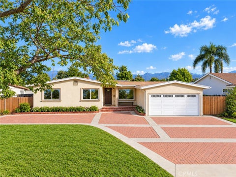 Photo of 1411 E Pioneer Drive, West Covina, CA 91791 (MLS # CV26220454)