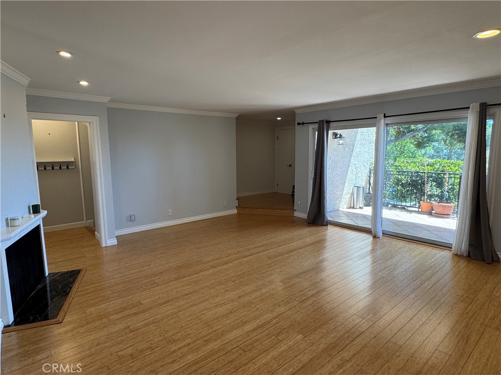 his stunning 4-bedroom, 3-bathroom townhome with an additional bonus room offers a total of five rooms, making it one of the largest units at 1,602 sq. ft. This property includes modern doors throughout, hardwood flooring, recessed lighting throughout and a custom walk-in closet in the primary as well as lots of natural light! . A charming private patio just off the living room is ideal for relaxing, entertaining, and watching the views. The attached two-car garage provides direct access with lots of ample cabinetry for storage, while the bonus room downstairs can serve as an office, gym, and lots of extra storage. Enjoy a resort-style living experience with incredible amenities, including 7 pools, a spa, 6 tennis courts, pickle-ball courts, basketball and volleyball courts, a playground, dog park, clubhouse, recreation room, dry sauna, and 24-hour security patrol.