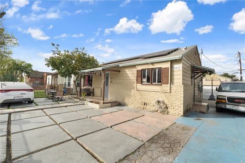 Photo of 511 S Pannes Ave, Compton, CA 90221 (MLS # DW26041984)