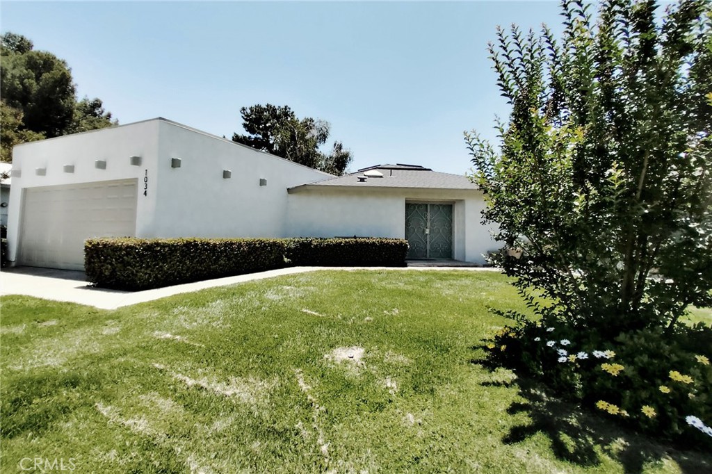 Live in REDLANDS for $479,000!! Come and see this 3 Bedroom (all with walk- in closets) 2 Bath-- PLUS enormous bonus room that can be your 4th bedroom, guest room, home office, workout room, or large indoor play space for kids. Sellers have recently made big improvements to include: new flooring, new paint inside and out, new quartz countertops & kitchen cabinets, new roof (2003), new AC/heating (2024) including new ducting, a tankless hot water heater, energy efficient windows & skylights with remote control shutters! There is a two-car attached garage with spacious overhead storage and an electric vehicle (EV) car charger. House will be partially furnished in addition to including a refrigerator, stove, microwave, dishwasher, washer & dryer, a large chest freezer! Small community of homes on a private street maintained by the HOA. Amenities include a swimming pool, hot tub, tennis courts. And HOA maintains all the outdoor grounds! Also included in the dues are water, sewer, trash! Live only minutes away from the 10+210 freeways, highly rated schools, downtown Redlands attractions and restaurants, the University of Redlands, Esri, and Citrus Plaza/Mountain Grove shopping center. It's a short walk to the near-by park! Great location to head to the mountains or desert. Check out the mountain views!