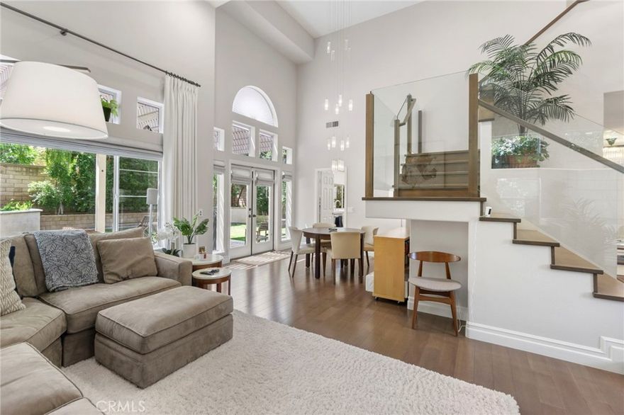 Welcome to this highly upgraded home with Solar Power ( low utility costs) !!!! in the Barcelona Tract of Tustin Ranch.  Completely remodeled in 2015 and all new appliances added in 2022.  From the wood floors to the Shade Store window coverings and Plantation Shutters nothing has been overlooked.  From the entry take in the dramatic high end wood and glass staircase that sets the tone for the whole home.  Find the special closet outside the powder room with built-ins for shoes and handbags.  Downstairs Powder Room. Solar Power completes this home.  Seperate Dining Room.  The Kitchen has an Large Island made with honed marble and Seating for 2, an oversized walk-in pantry, Exterior Sunshade and door leading to the backyard.  The 3 car garage has epoxy floors plus not one but two Tesla Chargers and plenty of storage !!  The downstairs Laundry Room has plenty of cabinets for storage.  The Comfortable Family Room has a Limestone surround Fireplace.  The backyard has a tall Pergola for shade.  Two Jack and Jill Bedrooms with Full Bathroom complete the upstairs space.  The Primary Bedroom has custom Shades both inside and outside the windows to cut down on light and heat. The primary bathroom has a walk-in closet with built-ins and a skylight as well as a remodeled walk in shower with Limestone.  The housing provider will not allow pets, no exceptions.  Link to application. https://apply.link/VrH13Zo