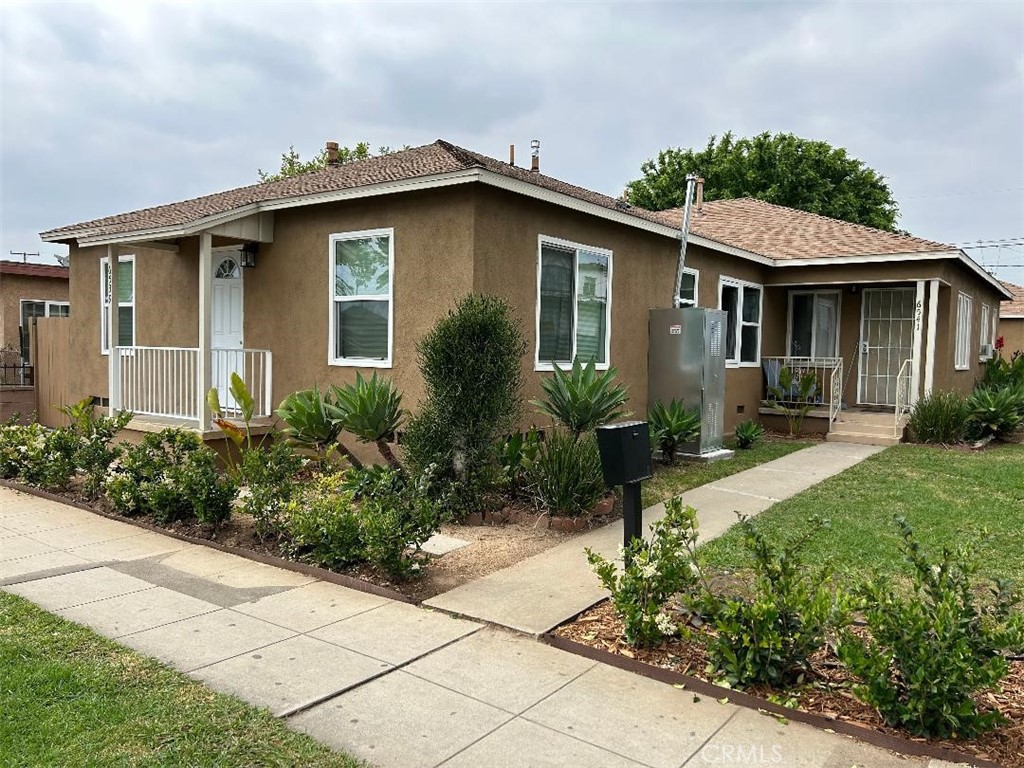 Duplex with two 2-bedroom, 1 bath units, with dining and living rooms, laundry areas, two 1-car garages, and front and rear yards. 6539 unit was remodeled in 2024 with permits (kitchen, bathroom, floorings, lighting, electrical, plumbing, windows, wall heaters, water heater, doors, paint, etc.). 6541 unit was partially remodeled around 8 years ago (kitchen, bathroom, floorings, etc.). The property has a double lot and this may allow for additional units to be built. Buyers to verify condition, living area, etc. of units.