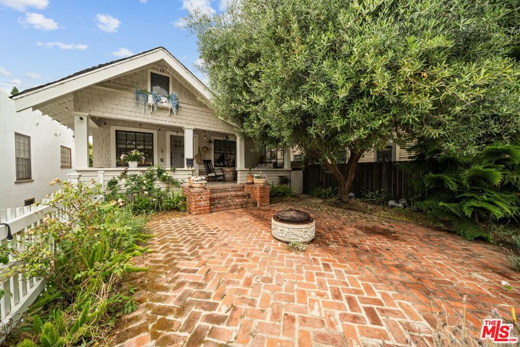 Rare family compound on double lot 3 blocks from beach and 1 from Main St. Walkers Paradise consisting of 3 individual homes each with their own unique characteristics. Owners have lovingly restored 2116 3rd St. a 2 bed 2 bath Craftsman cottage with 7 skylights for loads of natural light coming down from the exposed beam ceiling, wood-burning fireplace in living room and in bedroom there is a double sided gas fireplace between it and the master en suite. This home with charming front porch was built in 1901 but remodeled with top of the line finishes like herringbone white oak floors in living, dining and master bedroom, marble floors, in bathroom and kitchen with Cristallo quartzite kitchen countertops, and Le Cornue stove. Master bathroom in this house has a pedestal soaker tub and double marble jetted shower and a walk in closet with Elfa storage. Its second bedroom is also an en-suite with a walkout basement private access to backyard. Behind this home there is a smaller 2 bed 1 bath ready to put your own signature on it. Across the driveway next door is 2118 3rd St. another fully restored Mediterranean style 2 bed 2 1/2 bath 1928 spacious bungalow with modern updates that also has quartzite countertops in the kitchen and brand new wide plank, white oak floors. It has a 2 bed 2 bath walkout basement granny flat with farmhouse kitchen and marble tiled fireplace in living room with a view of the orange tree in the back garden. Both of these Mediterranean units have their own gas fireplace in living rooms. Both main masters have walk in closets. Ideal for families with grown children who want to remain close but have their own self contained spaces. This could also be a perfect arrangement for a group of close friends to go in together on an amazing property or have rental income. Numerous possibilities. Feels very quiet and private yet close to promenade and Abbott Kinney. Truly a one of a kind opportunity.