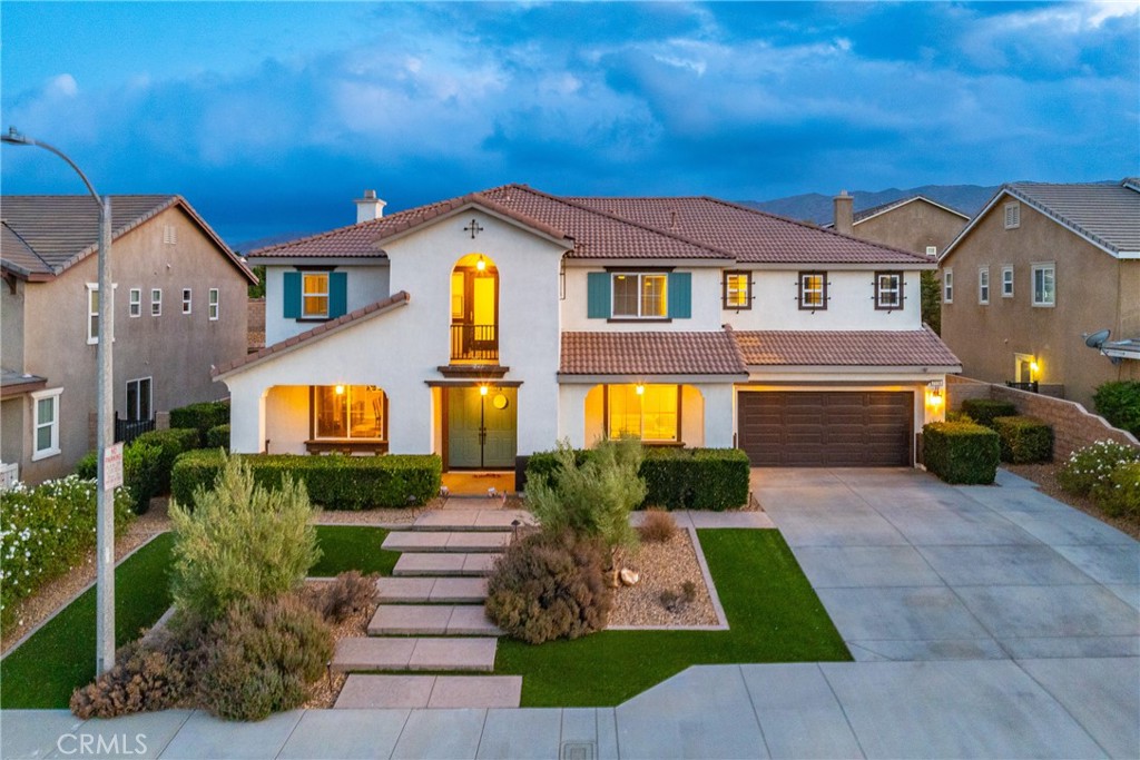***LIVE BEAUTIFULLY*** Welcome to this exceptional grand home located on West Ave L4, offering nearly 4,200 sq ft of luxurious living space and countless upgrades throughout. This 5-bedroom residence includes a massive loft/theatre room, perfect for movie nights, with $2,200 worth of home theater equipment, including a Silver Screen 120'' professional movie screen, Epson Home Cinema Projector, Polk Audio in-ceiling 7.1 surround sound, and an Onkyo 7.1 receiver. The home was painted and carpeted in 2015, ensuring a fresh and modern interior. One of the upstairs bedrooms features a private balcony, while the master suite is a true retreat, boasting a sitting room with a cozy gas fireplace, a spa-like en-suite bathroom with a jetted tub, and a huge walk-in closet designed for optimal organization and space. The spacious kitchen is complete with granite countertops and a custom-built media center in the family room, valued at $2,500. A downstairs office with French doors provides the perfect quiet workspace. The home also features a fully new HVAC system installed in 2022, a $25,000 upgrade, with the exterior units discreetly relocated to the side of the house. Outside, the property showcases a professionally designed and landscaped yard, a $200,000 investment that includes two-color stamped concrete, custom-designed grand entry stairs, and EasyTurf artificial grass in both the front and backyards for low-maintenance elegance. The backyard is an entertainer's dream, featuring a three-hole putting green, a pet-friendly dog run with artificial grass, and over 100 plants and trees supported by a high-efficiency drip irrigation system. The custom-engineered, insulated patio cover with three ceiling fans and fiber resin columns offers a comfortable outdoor space, while the separate electrical circuits and landscape lighting in both the front and backyards create a stunning ambiance. Additionally, the home features a four-car tandem garage, providing ample space for vehicles and storage. With nearly 4,200 sq ft of living space, this home combines elegance, comfort, and thoughtful design, making it the perfect place for both entertaining and everyday living.