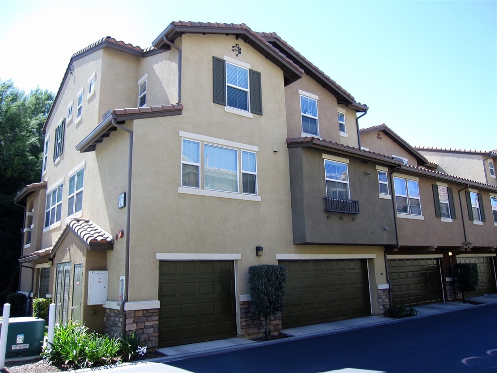 Located in the highly desirable gated community of Morningside Villa in Santee, this beautifully upgraded 3 bedroom, 3.5 bath, tri-level townhome features granite counters, stainless steel appliances, travertine flooring, plush carpeting, custom paint, full-sized, indoor laundry; peaceful & private balcony, 2 car attached garage. The master bedroom suite has two closets, dual sinks, separate tub & shower; one bedroom and bath on entry level. Community pool, spa, BBQ & play area. Neighborhoods: Morningside Complex Features: ,,,,, Equipment: Garage Door Opener, Range/Oven Other Fees: 0 Sewer: Sewer Connected Topography: LL