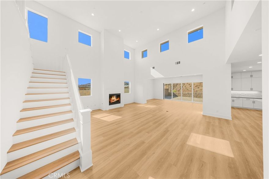 Over 160k upgrades included (floorings throughout, conservatory, coutertops etc.)!!!!– Plan 5520- Welcome to The Oaks at Portola Hills, a premier gated community! This brand new, never lived in 4 bedroom, 4.5 bathroom home offers an expansive 4,101 sq. ft. of living space, including an enclosed California room added to the interior. The living room features soaring two-story ceilings and a cozy fireplace. The open-concept kitchen is a chef’s dream, with upgraded countertops, abundant cabinetry, and three sinks for maximum convenience. A spacious downstairs bedroom suite is perfect for guests or multi-generational living.



Upstairs, you’ll find a versatile loft space and a luxurious primary suite with a highly upgraded limestone shower and spa-like bath. The backyard provides plenty of room for entertaining or relaxing outdoors. Additional highlights include a 2-car garage, solar panels, and a prime location near Foothill Ranch Town Center, top-rated schools, and easy freeway access.



Be the very first to call this exceptional home yours!