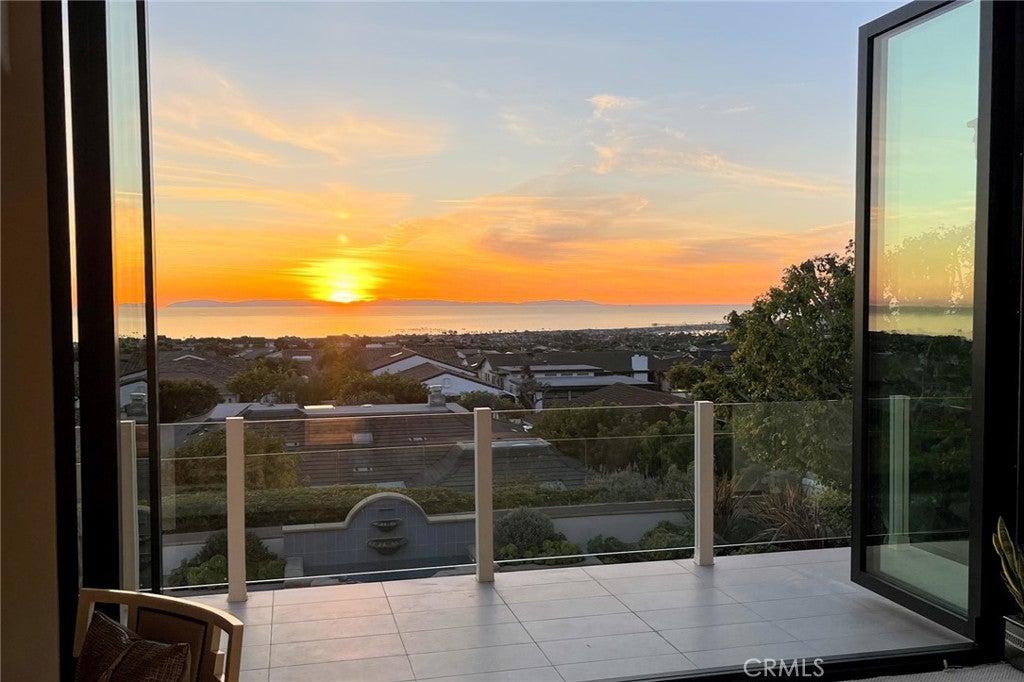 Photo of 1509 Sandcastle Drive, Corona Del Mar, CA 92625 (MLS # NP26118314)