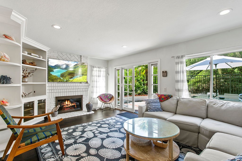 Available November 1st through June 30, 2026. Welcome to your coastal retreat in Dana Point! This beautifully furnished 3-bedroom, 3-bathroom home blends beach-inspired décor with comfortable living spaces, making it the perfect getaway or long-term stay. The main level offers a thoughtful layout with multiple areas to enjoy. The kitchen features stainless steel appliances, a cozy breakfast nook, and opens to the formal dining room for easy entertaining. A warm and inviting family room includes a fireplace and built-in shelving, while the formal living room, office space, and dry bar provide plenty of options for both relaxation and productivity. Also on the main level is a full bathroom and a full laundry room for added convenience. Upstairs, the spacious primary suite boasts a king-sized bed, large closet with built-in storage solutions, a dual sink vanity, and a tiled walk-in shower in the ensuite. Two additional guest bedrooms featuring a queen bed in one and two twin beds in the other, share a hallway bathroom with double sinks and a tub/shower combination—ideal for family or guests. Step outside to a private backyard with a grassy lawn, lovely gardens, trees that create some privacy, and large patio area with two sitting areas, perfect for dining al fresco or soaking up the California sunshine. An attached 2-car garage includes an outlet for an EV charger (charger not included). Tucked away in a private cul-de-sac, this home enjoys both peace and accessibility. Just minutes from the Lantern District, Doheny State Beach, and Dana Point Harbor, you’ll be close to shops, restaurants, and endless coastal activities. Rent as follows and includes all utilities with a monthly credit of $100 each for gas and electricity (tenants pay overages): 3–6 months: $7,500 per month, 6–9 months: $7,000 per month.