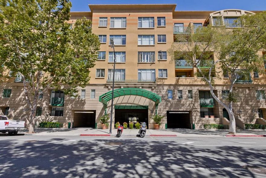 One of the most desirable & unique city homes in downtown San Jose! This spacious 1,493 sq. ft. end-unit condo offers modern comfort and privacy within a peaceful, gated community, an east-west orientation home is filled with natural light throughout the day. The rare end-unit layout provides quiet & privacy.Two master suites with walk-in- closets & full bathrooms.The big living room with dramatic to-ceiling windows for view of the mountain.The windows with customized shutters, bringing in warmth and brightness.Kitchen floor installed a newly SPC floor. A private balcony, two parking spaces close to the elevator. A separate locked storage unit.The building itself is also packed with perks like a gym, saunas, hot tub, pool, lockbox for delivered packages, community room with bar seating and areas for gathering, onsite management services.The location is unbeatable steps from San Jose State University, the MLK Library, within walking distance to SAP Center, San Pedro Square, the SoFA Arts District. Experience a vibrant downtown lifestyle with diverse dining,coffee shops, theaters, nightlife all just outside your door. Commuting is effortless with easy access to Light Rail,Highways,San Jose International Airport.Don't miss out on a chance to live the ultimate urban life in San Jose!