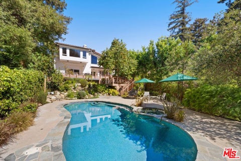 Photo of 1033 Wellesley Avenue, Los Angeles, CA 90049 (MLS # 26101978)