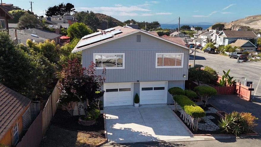 PRICE DROP ALERT! if you've been watching this home, now is the perfect time to take a second look. Don't miss your chance. Welcome to a truly special home with good bones in a rarely available and highly sought-after neighborhood just a short walk from Rockaway Beach, biking and hiking trails, parks, charming restaurants, and local shops. This beautifully maintained property sits on a spacious, flat, gated corner lot with over 8,000 square feet of fenced outdoor space of endless potential to expand, garden, boat/RV parking or even add another dwelling or ADU to suit your needs or just enjoy the coastal breeze in your own private oasis or the partial ocean views from the upper level. Upstairs features a light-filled 3-bedroom, 2-bath layout with new interior and exterior paint, new kitchen appliances and OWNED SOLAR, energy efficient living. Downstairs, a cozy and versatile 1-bedroom in law unit (approx. 561 sq ft) provides the ideal setup for guests, extended family, or rental income. Homes like this are a rare find in a sought-after neighborhood where homes are tightly held and opportunities are few. Easy Access to Hwy 1, San Francisco, Silicon Valley, SFO. Don't miss your chance! Schedule your viewing today or come by one of our open houses-