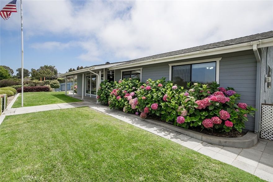 As you drive up to this home you will be amazed by the beautiful and low maintenance mature landscaping, including fruit trees. Multiple lemon, orange and avocado were the first I saw. As you walk to the front door you get caught by the ocean view, as well as the magnificent hydrangea flowers flanking the front of the home. Upon entering the home you will find lots of windows and natural light. The kitchen and living room on one side of the home while the three bedrooms on the other. The rear of the home has a large sun room with its own entrance into the backyard.