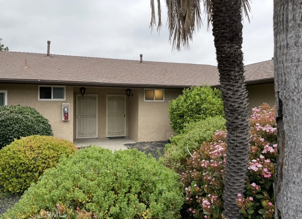 Beautiful upgraded spacious single level apartment unit close to freeway, shopping and schools. This unit has been totally remodeled and move-in ready. The unit features a large living room with laminated flooring, kitchen with granite counters, upgraded cabinetry which includes a new stove/oven, dining area next to kitchen, 1 bedroom with ceiling fan and remodeled full bath. Unit has its own private patio for relaxing outdoors. A one car garage in the rear of the unit. There is a community laundry room located on site.
