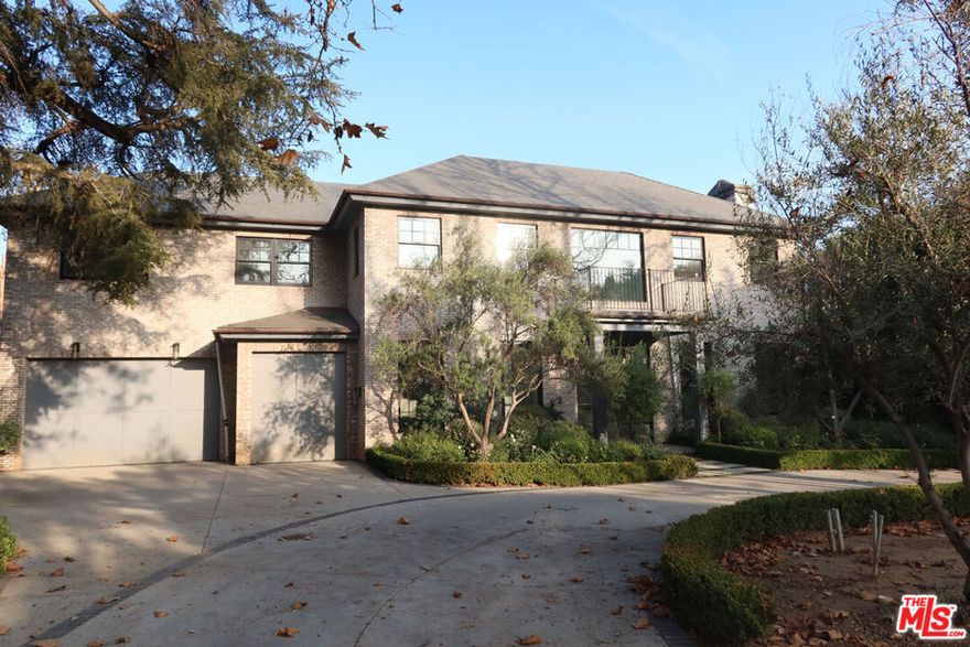 New Construction in coveted Brentwood Park. 306 N Cliffwood Avenue offers a rare opportunity to complete your dream estate with views. This expansive 11,392 SF residence is 95% completed with just the basement and small items to complete the vision. This masterfully envisioned by renowned architect Ken Ungar and developed by Rob Heltzer, delivers grand scale, exceptional privacy, and limitless potential. Set amid lush, mature landscaping, a grand circular motor court introduces the stately facade, where timeless architecture meets graceful scale and a commanding sense of arrival. Inside, light and elegance abound at every turn with soaring ceilings and multiple living and dining spaces. Expansive French doors illuminate the space with natural light and allow for effortless indoor-outdoor living. Upstairs, the primary suite offers a private oversized balcony overlooking the lush grounds, a romantic fireplace, dual walk-in closets, and his and her spa-inspired bathrooms. The resort-like pool and spa, built-in barbecue, and lush, manicured landscaping come together to create a seamless setting for gatherings that flow effortlessly from day to night. The basement level remains unfinished, but is structured for a gym, media room, rec room, wine cellar, and bedroom. Just moments from top-rated schools, dining, shopping and entertainment, 306 N Cliffwood Ave unveils a truly rare opportunity to embrace enduring value and the epitome of Westside living. This is one you won't want to miss. *Property to be sold in AS-IS Condition. Bankruptcy Sale*