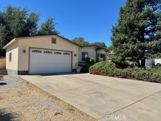 Three bedroom, two bath manufactured home in the desirable gated community of Heritage Ranch, just minutes from the shores of Lake Nacimiento. Over 1700 square feet of living space featuring a spacious living room with wood burning stove, kitchen with tile countertops and ample cabinetry, and a family room with views to the open space behind the home. Enjoy summer evenings on the large, covered patio, shaded by a mature Oak tree.
Enjoy all the amenities Heritage Ranch has to offer, including lake access, equestrian center, trails, pools and more! Whether you're looking for a weekend get-a-way, investment property, or full-time residence, this home is ready to welcome you!