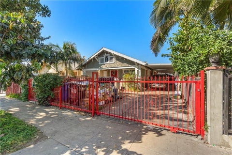 Photo of 1611 46th Ave, Los Angeles, CA 90062 (MLS # SB26191185)