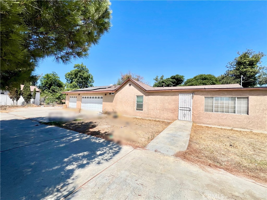 Spacious Single Story Home on a Generous Lot. This home offers excellent potential with its expansive lot, long driveway. Features 5 bedrooms, 3 full bathrooms, offers the ideal blend of space, functionality, and versatility for today’s modern lifestyle, such as home offices & growing families. All bedrooms are designed with large space in mind. Master bedroom has walk in closet and loft area. Sizable dining area right next to the kitchen, kitchen features many usable cabinets. Laundry area inside the home by hallway for your convenience. Central HVAC. Newer roof. Newer floors. Newer kitchen cabinets. The layout provides an excellent foundation for multi-generational living, with flexible spaces that can easily be adapted for separate living quarters, guest accommodations, or private retreats for rental. The expansive lot provides opportunities for outdoor entertaining, gardening, play area for growing family, or potential swimming pool area, or RV parking. Security gate leads to the private long driveway, and leading to the three car space garage. Nearby schools, shops, restaurants, parks, markets, Home Depot, easy access to 210 fwy, 10 fwy and 15 fwy, as well as nearby Kaiser hospital. Move In ready!