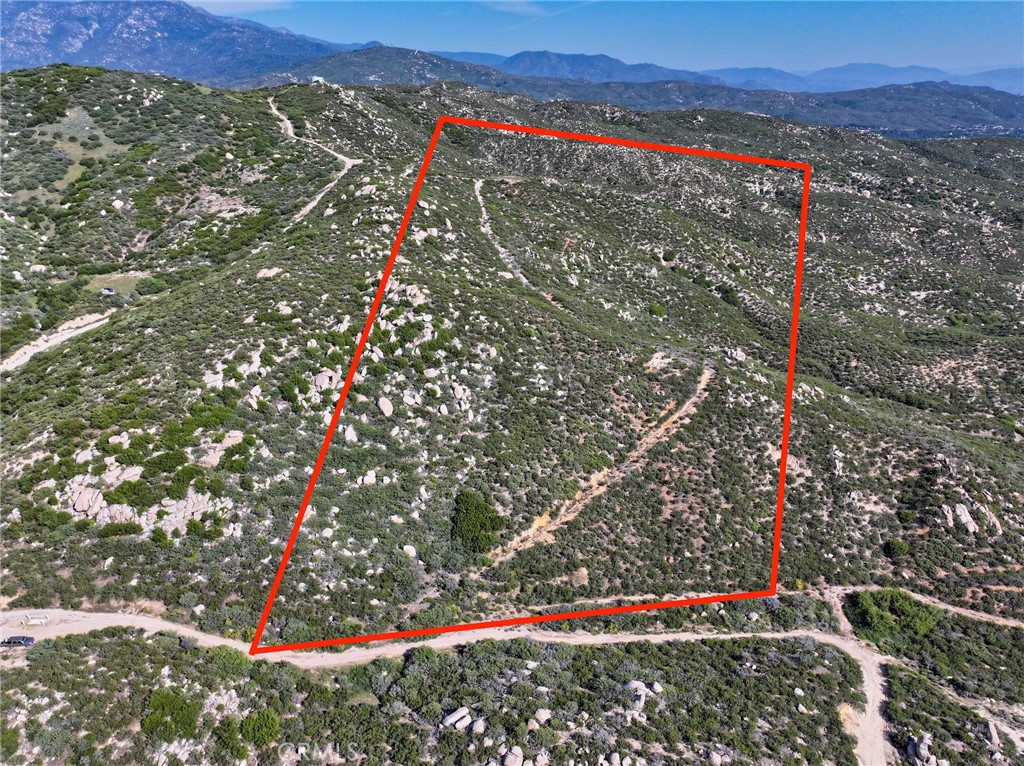 20 Acres of Possibility in Riverside County. Just north of Banning, this expansive parcel offers direct road access, and endless potential. Whether you’re envisioning a private estate, a working ranch, or a multi-generational compound, this land gives you the space and setting to bring your vision to life. With wide-open skies above and rolling terrain around, it’s a rare opportunity to own a sizable piece of California’s inland charm. Dream big—this land can hold it.