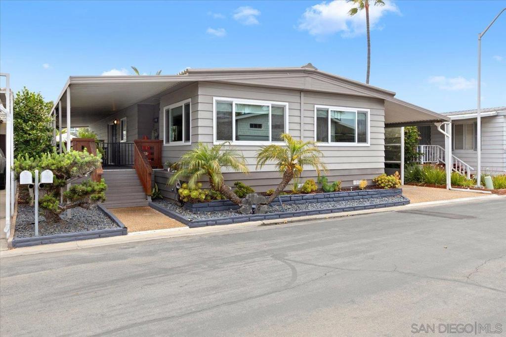 Zen by the Beach! This Beautiful home is designed for comfort and RELAXATION! Kitchen has been fully remodeled with upscale SS appliances! Newer Vanities in Both Bathrooms! LVP throughout home! Backyard IS HEAVEN!! Quiet/Covered/Private areas for you to enjoy the beautiful Carlsbad weather! OH and don't forget the LAKE VIEWS from your spacious Living Room!! ** No Property Taxes** 3 YR OLD HVAC hybrid system (Gas Heat & Electric Heat Pump AC)! Home was recently re-leveled professionally with upgraded 16 piers/pads and 6 new center supports! HUGE Storage Shed AND a Large Gardening Shed too! Lakeshore Gardens Community offers many social activities, fitness classes as well as informative events. Two blocks away from Carlsbad State Beach, with live music on weekends and The Camp Store with fresh pizza and local craft beer.