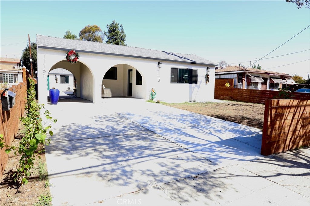 1113 1115 W Hellman AVE