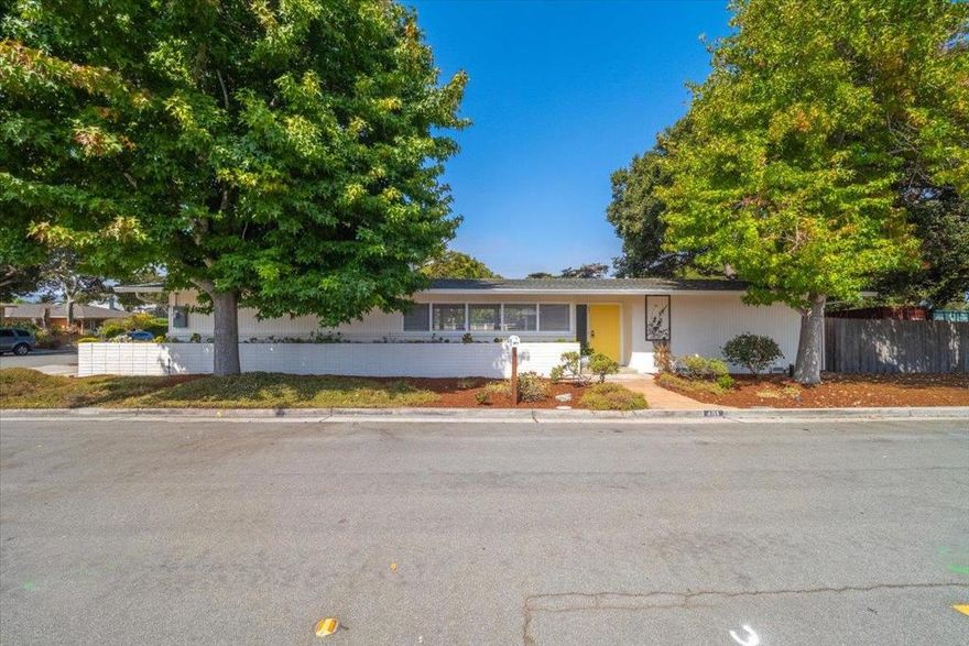 First time on the market!  Built in 1960, this single level home was designed and built in the style of Mid Century Modern by family patriarch.  Wood flooring adds warmth to the common living area - expansive glass windows fill the interior with plentiful natural light.  Relax, read or entertain by the living room fireplace.  Kitchen overlooks fenced outdoor space with private patio and raised bed.  Two restful bedrooms with wood floors feature cedar planks in the closets.  Spacious carport accommodates 2 vehicles and closets for storage.  (Maybe enclose for garage in the future?)  Large side yard for pets and/or kids and a lockable shed.  Property conveniently located close to Laguna Grande Park, shopping and access to Highway 1.  Come see ASAP - you'll want to make this house your happy home.