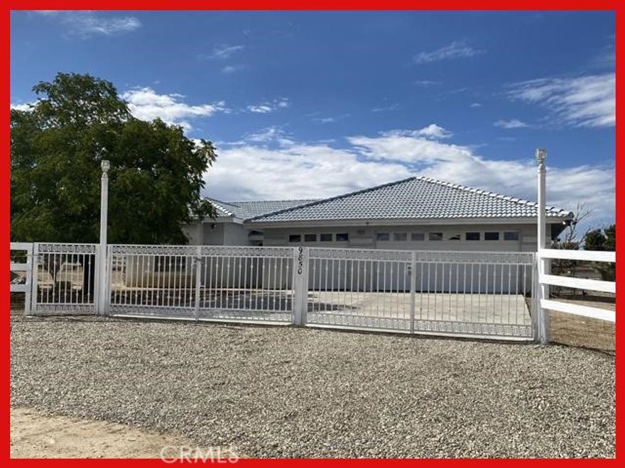 Investor Special! Asking price reflects needed maintenance/cosmetics. Cash or rehab loan only. Home is on an over 2 acre fenced corner lot,  just off of paved Johnson Road. Great location, walk to town! Located in by Snowline Unified School District. Beautiful wrought iron double gates in several locations for RV access and parking. Beautiful newly painted white rail fencing around front/side of property. Can be a very nice home with a some TLC. And it is on natural gas too!

Enclosed patio room, Gazebo, Oversized three-car garage and loads of RV parking. Great property for horses, livestock, RV enthusiasts, hobbyists, home business. Spacious great room with rock fireplace, kitchen nook, 3 spacious bedrooms, master bath with double sinks, garden tub, separate shower.  Great opportunity for the right buyer. Storage shed is reserved but negotiable.