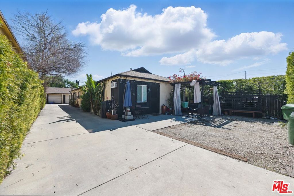 Prime Investment Opportunity in North Hollywood!Don't miss this incredible chance to own a fully gated income-producing triplex in one of LA's hottest rental markets! This property features three updated units: a spacious 1-bed/1-bath + office with private laundry, a 2-bed/1-bath with in-unit laundry, and a 1-bed/1-bath all offering strong rental potential.Recent upgrades throughout all units, plus a brand new roof, deliver turnkey peace of mind for investors or owner-occupants alike. A detached two-car garage offers ADU potential (buyer to verify), and the long driveway with a rolling security gate provides abundant off-street parking.Private yard space at the rear adds bonus appeal for tenants. Centrally located with convenient access to the 101, 170, and 405 freeways, as well as nearby shopping, dining, and employment centers everything renters are looking for.Whether you're expanding your portfolio or seeking a smart first-time investment, this North Hollywood triplex checks all the boxes!