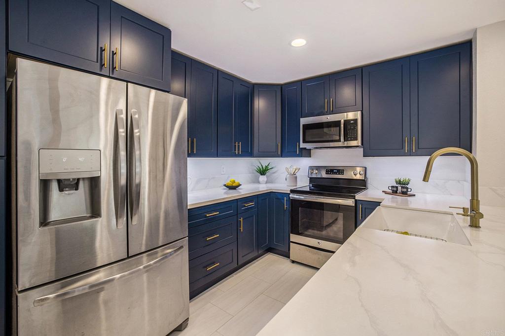 Live the San Diego Dream in Comfort, Style & Coastal Breeze. 2BR/2BA South Facing Single Level End Unit with 1,118 sq ft and Lots of Natural Light. Contemporary Upgrades includes Beautiful Sustainable Bamboo Flooring, Quartz Countertops, Porcelain Farmhouse Sink, White Tile Kitchen & Bathroom Floorings, Stainless Steel Appliances, Custom Kitchen Cabinetry with 2 Lazy Suzy, Pop Out Drawers and Plenty of Cabinets. Gas Fireplace. Large Ensuite Bedroom with 2 Closets including a Walk-in Closet, Custom Built Vanity Quartz Countertops. The Junior Bedroom has 2 Closets and a Storage Cabinet. In-unit washer and dryer. Two External Storage Closets. 24-Hour Guard Gated. Enjoy Resort-Style Amenities with Pools, Jacuzzi, Sauna, Tennis & Pickleball Courts. Pet Friendly with Greenbelts & Walking Paths. BBQ Area at the Lagoon. Conveniently Located, Minutes to Downtown, La Jolla, Fashion Valley w/Luxurious Shopping & Dining, Old Town, Hillcrest, Balboa Park, USD, Airport, Golf, and Tecolote Canyon Trails. Bike-able Path Access to Beaches & Mission Bay. FHA & VA Approved.