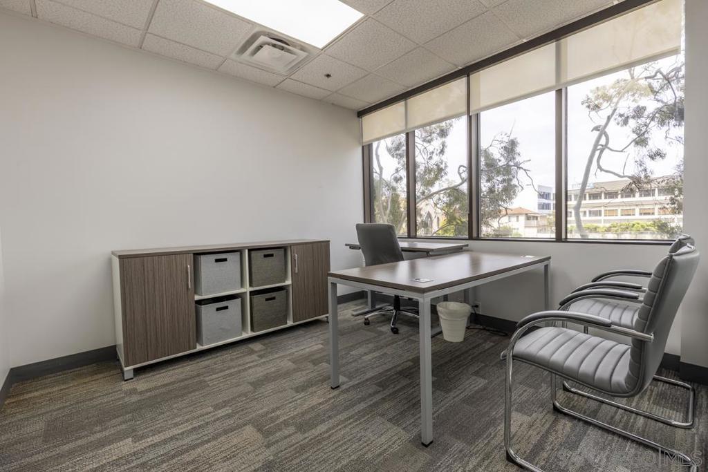 Discover an exceptional office rental opportunity in the heart of Downtown San Diego! INDIVIDUAL, PRIVATE PROFESSIONAL OFFICES FOR RENT within a fully functioning and all inclusive office suite. This 1,700-sqft suite offers 8 individual offices, each for rent separately, with a professional and fully equipped environment ideal for businesses seeking a prestigious address with convenience and comfort. Amenities included in rent: Front desk receptionist to greet visitors and accept packages during specific hours, high-speed internet broadband, gas and electricity utilities, business mailing address, nightly janitorial service, access to community lunchroom, professional scanning and printing equipment (limited monthly photocopies), and document shredding services. This office is ideal for any professional services, legal teams, startups, or any businesses seeking a modern, move-in-ready space in a central and vibrant location downtown. Schedule a tour today and secure your spot in one of San Diego’s most sought-after commercial hubs! Suite 325-3 is an end office with an exterior-facing window, sized 11' x 12' for an approximately 116-square foot, locked off, private room that only you can access or use. It also includes access to the remaining 700+ square feet of community, reception, and printing space within the shared suite area. along with access to all building amenities. The only item not included in rent is optional parking, which costs $180/month/space in a secured, non-reserved garage attached to the building. Exceptional Office Space in the Heart of Downtown San Diego – 1,700 Sq. Ft. total space, 8 individual offices | Individual Offices for Rent in a Suite! Position your business for success with a beautifully maintained and fully functional office suite located in the vibrant core of Downtown San Diego's Cortez Hill. Designed for productivity, professionalism, and comfort, this space is ideal for companies looking to establish themselves in a prestigious and well-connected business district. The suite features eight private, individual offices available and a welcoming front desk/reception area, creating an ideal layout for teams of professionals, legal practices, startups, and client-facing businesses. Whether you're expanding or seeking a high-quality satellite location, this suite offers all the essentials for a seamless move-in experience. Included Amenities: Front reception desk attendant Internet, gas, and electricity utilities included—fewer bills to manage Mailing address for business use, adding credibility to your operations Nightly janitorial service for a consistently clean and professional space Modern lunchroom that’s pristine, inviting, and perfect for breaks or informal team gatherings Access to scanning equipment Limited monthly photocopies to support daily operations Secure document shredding services for confidential disposal Parking for an additional $180 per month per space Select offices feature stunning views of Downtown San Diego and the southern tip of Balboa Park, creating an inspiring workspace for you and your team. Whether you're meeting with clients, collaborating with colleagues, or focusing on solo work, this office offers the infrastructure and environment to support your growth. Don’t miss the opportunity to work in one of San Diego’s most sought-after commercial hubs. Schedule your tour today and take the next step for your business.