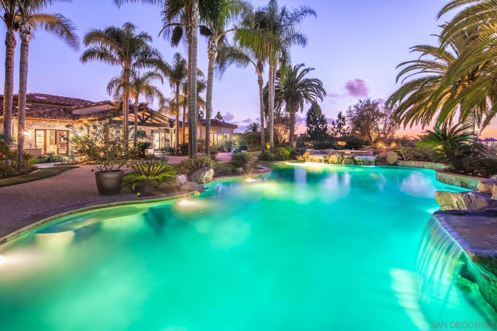 Single-level, custom-built estate with panoramic ocean views! This stunning 5 bedroom home features a detached 1 bed/1 bath guest house with its own kitchen, formal in-home office/library, custom movie theater, billiards room with bar, private golf putting green, covered outdoor patio with fireplace & TV, fire pit, stunning resort-style pool/spa with cascading waterfalls & spacious 6 car garage all atop a perfectly landscaped 1.49 acre premier lot in one of the most exclusive guard-gated communities in San Diego, Rancho Pacifica. Freshly painted, this light bright estate offers an ideal open floor plan perfect for both relaxing & entertaining. Minutes to the area's best golf/tennis clubs, award-winning schools & brand new shopping centers & located just a few miles from the beach, this stunning home has it all & more! Architectural Style:  Custom Built View:  Custom Built Complex Features: ,, Equipment:  Dryer,Fire Sprinklers,Garage Door Opener,Pool/Spa/Equipment, Range/Oven, Satellite Dish, Vacuum/Central, Washer Sewer:  Sewer Connected Topography: LL Frontage:  Canyon, Open Space