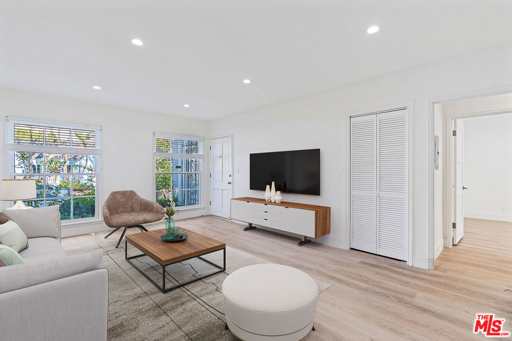 Modern and updated apartment. This spacious two-bedroom, one-bathroom unit features hardwood flooring, great natural light, and recessed lighting throughout. The kitchen is equipped with stainless steel appliances, including a refrigerator, stove, dishwasher, and microwave. Additionally, a washer/dryer is located inside the unit, and the bathroom features a double vanity. The unit also includes wall-mounted AC.Located on the corner of Maple and Alden in Beverly Hills - 90210 / PRIME Beverly Hills. 1- Parking Space Only (street permit parking available for additional car)