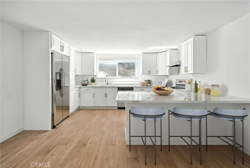 Remodeled dream home on a HUGE creekside lot… Discover the serenity and charm of “Sleepy Hollow” living in this beautifully remodeled home. Nestled in coveted Sleep Hollow, this residence captures the essence of peace, nature, and small-town charm. Imagine relaxing at sunset on your balcony while listening to the soothing sounds of the creek —a rare and tranquil treat. The home has been lovingly updated from the modern kitchen, fully renovated baths, designer paint, new flooring, and walk-in closets. It even has ADU potential. The versatile floor plan features 2 bedrooms & a full bath on the main level while the private upstairs primary suite offers its own full bath & a balcony overlooking the picturesque canyon and yard.
Life in Sleepy Hollow is truly unique: a peaceful, rural setting that feels worlds away, yet minutes from the McCoy Equestrian Center, Sleepy Hollow Community Center, dining, shopping, top-rated schools, and commuter routes. Don’t miss this rare opportunity to own a fully renovated home in one of Chino Hills’ most beautiful and enchanting neighborhoods. Homes here are seldom available, and this one is move-in ready, offering a perfect blend of modern comfort and timeless tranquility