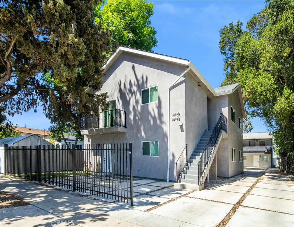 We are proud to present a compelling investment opportunity to acquire a 6-unit Multifamily Property in the High Demand Van Nuys Market within Los Angeles’s San Fernando Valley.
Strategically positioned bordering the highly sought-after Valley Glen area, 14161 Friar Street offers investors a foothold in a location with significant rental upside. Situated just south of the major thoroughfare of Victory Boulevard and west of Hazeltine Avenue, the property benefits from excellent access to a wide array of amenities, transportation options, and the ongoing growth and revitalization of the surrounding Van Nuys and Valley Glen areas. This offering represents a unique chance to acquire a well-located asset with significant potential in a thriving Los Angeles submarket.
Presenting a unique blend of classic charm and contemporary style, originally built in 1913 but extensively renovated within the last 18 months, the meticulously built two-story property offers a desirable unit mix of four one-bedroom/one-bathroom and two spacious three-bedroom/ two-bathroom residences. Showcasing a mix of extensive renovation and new construction, the unit interiors feature central AC and new technology heating, and wood flooring. Kitchens are equipped with modern appliances, stylish tile backsplashes, quartz counters, and storage. Additional features include recessed lighting, base moldings, ample natural lighting, new bathroom vanities, new tubs/showers, and new windows. Select units offer private balconies. The property’s exterior has also undergone significant improvements, including newly paved asphalt for ample on-site parking, well-maintained low-maintenance landscaping, and fresh exterior paint. Practical updates include new gutters for effective rainwater management and new utility meters. The pitched composite roofing adds durability and a clean, updated look to the building’s profile.
Whether you’re a first-time investor seeking to enter the market, a seasoned investor looking to expand your portfolio, or considering a 1031 Exchange, this property offers exceptional stability and long-term value.