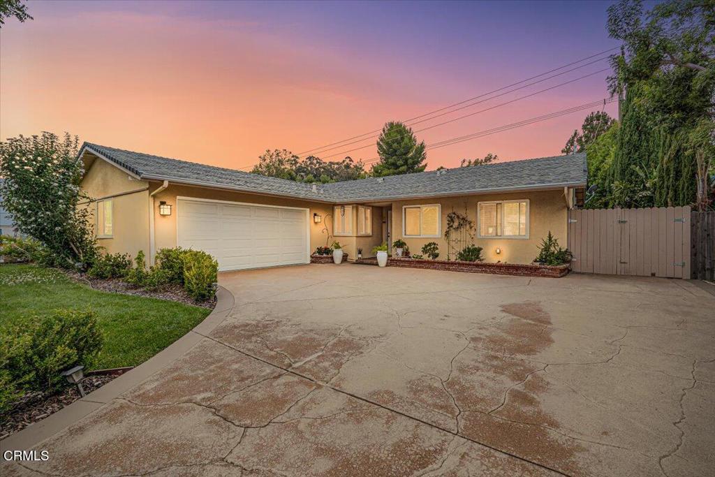 This beautifully maintained single-story pool home blends classic charm with contemporary upgrades, offering comfort, style, and smart-home features throughout. From the moment you arrive, the inviting curb appeal sets the tone with lush landscaping and a warm, welcoming entry.Inside, natural light pours through dual-pane windows and sliding glass doors, highlighting stunning wide-plank oak wood floors. Elegant 5-inch baseboards and crown molding add timeless sophistication to the thoughtfully designed layout.The kitchen is both stylish and functional, featuring updated appliances and ample workspace--perfect for daily living and entertaining. The floorplan strikes a perfect balance between open-concept gathering spaces and private, quiet bedrooms.Step outside to a tranquil backyard oasis that backs onto a peaceful arroyo and a brand new deck offering privacy and serenity. Enjoy warm days by the sparkling pool, relax under the sun, or entertain guests in your secluded outdoor retreat. Two mature orange trees provide fresh fruit and a touch of California charm.Modern upgrades include a newer HVAC system with upgraded ductwork, smart thermostat, fully updated electrical, centralized WiFi repeater, and CAT6 Ethernet wiring. The finished 2-car garage offers built-in storage, a workbench, ventilation fans, and a newer smart-controlled garage door system.As night falls, solar lighting gently illuminates the driveway and garden, adding magic to this exceptional home.Don't miss this rare opportunity to own a home that combines timeless elegance with the convenience of modern living.