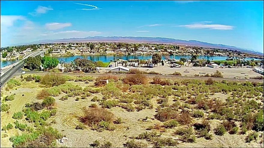 BUILD YOUR LEGACY WHERE THE DESERT MEETS THE RIVER



Hidden Gem Between the Colorado River & Golf Course – Resort Living, Trophy of the Tri-State Area!



City-Approved Final Tract Map #20478 – 57 Home Lots Approved for Single Family Homes and RV Pads in a Gated Subdivision with River & Golf Course Views + Private Access to the Public Rivers Edge Golf Course.



Discover RiverLux Resort, a 15.22± acre city-approved development spanning seven parcels overlooking both the Colorado River and Rivers Edge Golf Course. With PUD and C-2 zoning, this property offers unmatched flexibility for luxury residential, resort, or mixed-use development.



Imagine your next project steps away from the river, golf course, and recreation hotspots. Positioned (~500ft) off the Colorado River, (~1/8 mile) from Needles Marina and (~1.29 miles) from  Jack Smith Park, two boat ramps, and within reach of Lake Havasu (~40 minutes south), Topock (~10 miles south), Pirates Cove (~10 miles south), and Laughlin (~29 minutes north). The high-visibility commercial site sits at the heart of the Tri-State’s growth corridor. Enjoy the unique advantage of private, direct access to the golf course.



Perfect for:                                                                                                                                            

Gated residential community                                                                                                                 

Resort or boutique hospitality                                                                                                                   

Drive-thru, retail, or mixed-use development



Conceptual plans and due diligence documents, including Tract Map #20478, are available upon request.