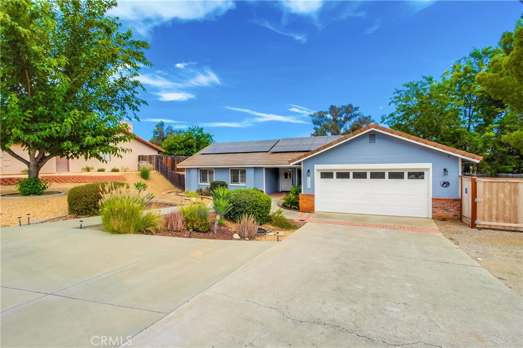 Welcome to this single-story home in the San Diego Country Estates. The open floorplan features vaulted ceilings, plantation shutters, and a spacious living area with a brick fireplace and French doors leading to the backyard. An additional large room is attached to the primary suite — perfect as a retreat, home office, gym, or anything you want it to be.
From the front yard, you’ll enjoy beautiful mountain views. Out back, there’s RV parking for your toys, two storage sheds, fruit trees, and a large yard with plenty of space for horses or entertaining. The back gate connects directly to scenic hiking trails, putting nature right at your doorstep.
Practical updates make this home move-in ready, including a roof that’s only seven years old and 23 paid solar panels to help keep energy costs down.
Life in San Diego Country Estates comes with resort-style amenities: pools, spa, fitness center, tennis club, driving range, basketball courts, dog park, equestrian centers, and miles of horse, biking, and hiking trails.
This home combines comfort, flexibility, and a community lifestyle that’s hard to beat. Schedule your showing and see how it can fit your vision.
This home combines comfort, flexibility, and a community lifestyle that’s hard to beat. Schedule your showing and see how it can fit your vision.
