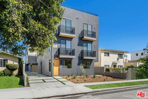 Photo of 1/2 Carmona Avenue, Los Angeles, CA 90016 (MLS # 26834667)