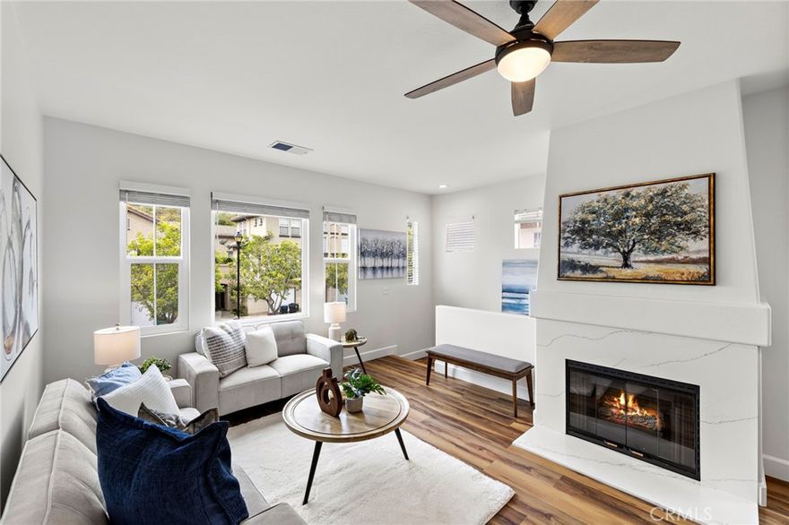 Welcome to this beautifully upgraded condo nestled in the desirable Wagon Wheel community! Step inside to discover fresh interior paint, stylish new LVP flooring throughout, and a bright, modern kitchen featuring sleek quartz countertops, crisp white cabinetry, and stainless steel appliances. The cozy living room is enhanced by a quartz-accented fireplace, and a charming private balcony offers the perfect outdoor retreat. This thoughtfully designed home offers two spacious bedrooms, including a primary suite with a generous walk-in closet. The updated bathroom adds a touch of luxury with its modern finishes. Enjoy the convenience of an attached one-car garage with direct access. Residents of this well-maintained community enjoy access to a sparkling pool and relaxing spa. Ideally located near award-winning schools, the 241 toll road, shopping, dining, and more—this is one you won’t want to miss! Come see it today and experience all that Wagon Wheel living has to offer.