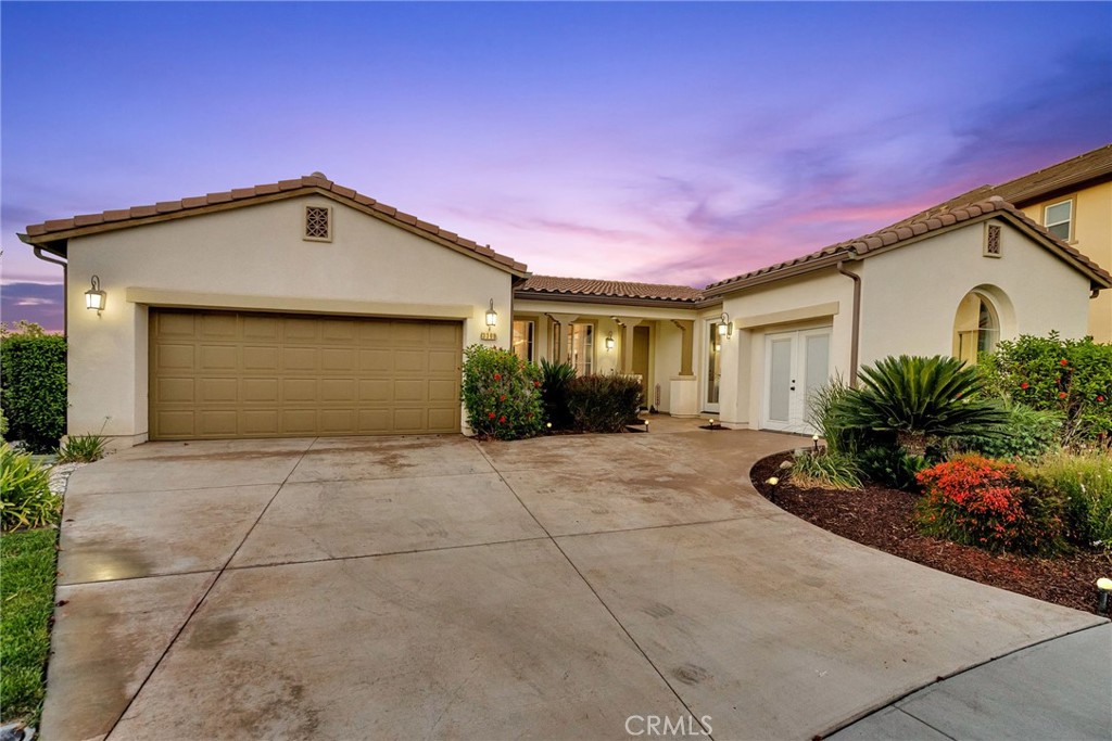 LA SIERRA SOUTH- RIVERWALK VISTA- This beautiful single level residence is located on an elevated cul-de-sac lot providing sweeping panoramic views of the city lights hills and mountains beyond! Formerly a model home and loaded with upgrades this home is now offered in turn-key condition. Flexible floorplan offering a formal living or dining room off the foyer currently used as a pool table room; Large separate family room off the open island kichen with large dining space, all built-in appliances, granite counters, butler's pantry and walk-in food pantry. Separate primary suite with upgraded marble bath, walk-in closets and doors to the back yard; Four additional family bedrooms and large bath off the foyer haul; Separate guest bath; Expansive back yard with pergola patio, outdoor lighting, cozy firepit and glass view fencing. Community amenities include massive pool and spa, playground and parks and walking paths throughout. Gate guarded for added security and located just minutes from the conveniences of shopping, West Riverside Metrolink Station and a short drive to La Sierra University, California Baptist University and even the University of California Riverside.