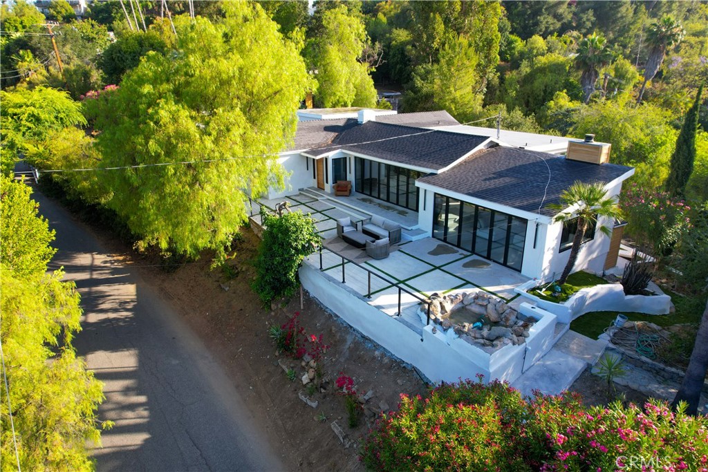 Welcome to a Complitly Remodeled Home. Your Client Will LOVE this Beautiful Modern turnkey home in Topanga Canyn. With ADU opportunity With Two Seprated drive Way, Street To Street. Located on a quiet street, This modern home has high ceilings and an open floor plan. Updated kitchen and bathrooms allow you to move in and enjoy. Spacious laundry/storage room Kitchen, Bathrooms, Living Room, Bedrooms, and Garage just renovated. Open floor concept, perfect for entertaining. New kitchen with Kitchen Aid appliances, LED Recessed Lighting through home, Beautiful Master bathroom with walking closet, Large yard and back yard with Planty of room for ADU to create a rental property, Fire pit. This home is exactly what your buyers are looking for. Great opportunity for Air B & B & Long Term Investments. IT IS A MUST SEE. Show this one and make it your Cliant HAPPY.