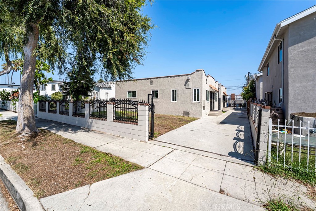 *** AMAZING INVESTMENT OPPORTUNITY *** Updated & Vacant 4-unit Property. Very sought after income producing 4-UNIT property. 2-Seperate Buildings that boasts 1,904 sq/ft of living space on a 6,792 sq/ft lot. Both buildings consist of one 2-bedroom, 1-bathroom unit and one-1-bedroom, 1-bathroom unit. Each unit has a front entrance and rear entrance with Security doors. The 4-UNITS have been updated with the following upgrades: Double Pane windows, vinyl flooring, Lights, Kitchen counter tops, Kitchen Cabinets, Free standing ranges, Hood Fans, ceiling fans, etc etc. All 4-Units have been freshly painted in the interior and exterior. There are 4 separate gas and electric meters. There are 4-single car garages used mainly for Storage. A security gate at the front and rear of the property. Mailboxes at the front of the property. Agents bring your INVESTORS. *** AMAZING INVESTMENT OPPORTUNITY to add to your portfolio or to get started on an updated 4-UNIT.