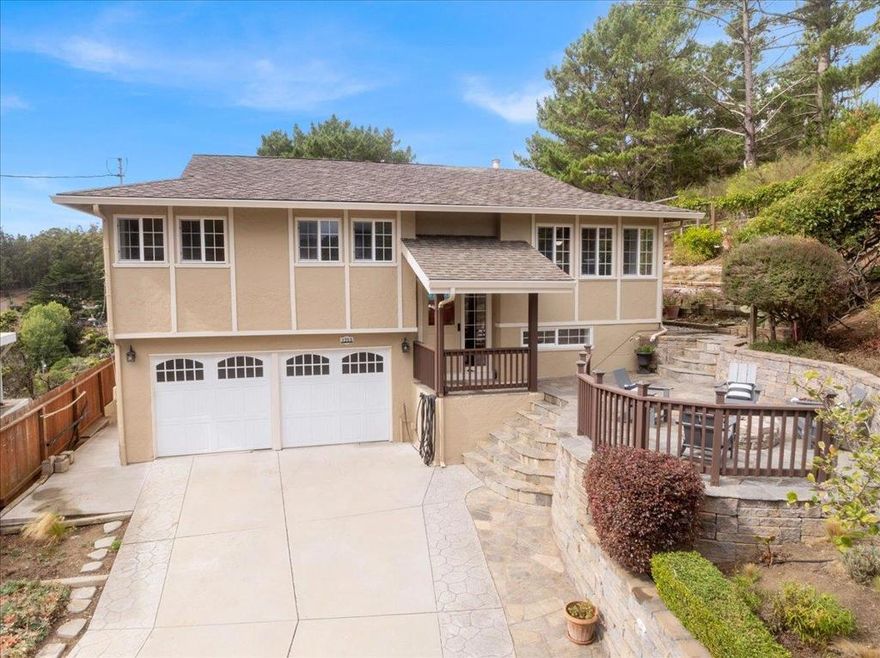 Welcome to this exquisite home nestled at the end of a tranquil cul de sac in the desirable Sun Valley Area of Pacifica. Enjoy breathtaking mountain and valley views from both the front and back of the home. Seamless access from open concept living area to stone patio in front as well as to dual decks in back allow you to immerse yourself in the serene surroundings.  The heart of the home is its stunning remodeled island kitchen flowing into the living and dining areas making it perfect for entertaining and family gatherings. Stainless steel appliances, quartz countertops, custom cabinets and tons of natural light make this a chef's delight. Three bedrooms and two updated baths round out the main living level. Downstairs, additional bonus rooms provide flexible living options; currently used as a family room, bedroom and bath not completed with benefit of permits.Large two car side by side garage also has laundry area an extra storage. Generous 7,548 square foot lot with lovely terraced garden; this property promises privacy and comfort. Don't miss the opportunity to own this exceptional home!