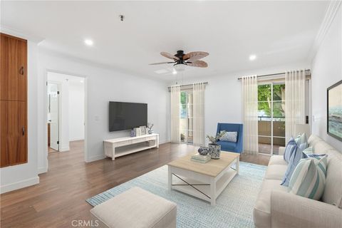 Photo of 801 Pine Ave #104, Long Beach, CA 90813 (MLS # SB26103209)