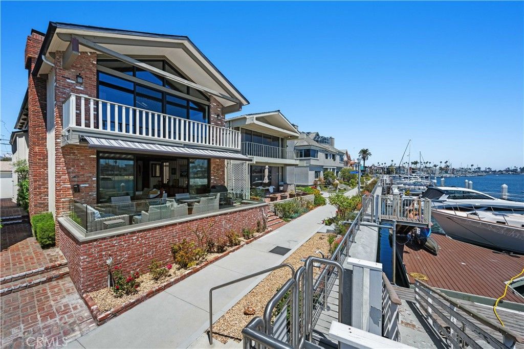 Photo of 5625 E Corso Di Napoli, Long Beach, CA 90803 (MLS # PW25239594)