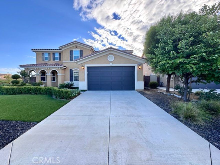 This spacious corner residence offers exceptional curb appeal, an attached 3 car tandem garage, and a prime location close to schools, shopping, dining, and more. Enter inside to a bright and airy great room featuring upgraded flooring, soaring ceilings, and an abundance of natural light from the numerous windows. The open concept layout flows seamlessly from room to room, creating an ideal space for both everyday living and entertaining. The main level includes a private bedroom and full bathroom, perfect for guests or multigenerational living. Toward the heart of the home, you'll find a chef inspired kitchen complete with beautiful white cabinetry, white countertops, beautiful blacksplash, an oversized center island, and a large walk-in pantry. The kitchen opens effortlessly into the dining area and expansive family room. A versatile bonus room on the main floor adds even more functional space and provides direct access to the garage. Upstairs, a generous loft offers an additional living area, perfect as a media room, playroom, or home office. The luxurious primary suite is truly oversized and features an ensuite bath with separate dual vanities, an oversized soaking tub, separate shower, and two walk-in closets! The remaining upstairs bedrooms are all generously sized, and the conveniently located upstairs laundry room adds to the home's practicality. Venture outside to the beautifully landscaped private backyard, where a spacious concrete patio with a pergola sets the perfect scene for outdoor dining and entertaining. The artificial turf and lush landscaping create a low-maintenance, inviting space, while the generous grassy area offers plenty of room for play or simply unwinding. Residents of Mahogany Hills enjoy access to community amenities including parks, tot lots, a soccer field, basketball courts, and scenic walking trails. Don't miss your opportunity to lease this incredible home, schedule a tour today!