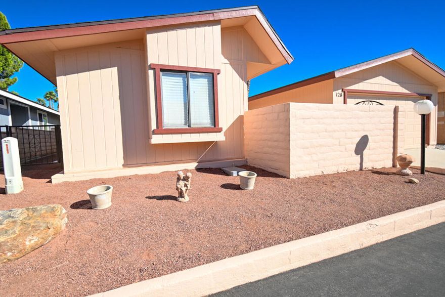 A surprisingly charming and well cared for  second home for the seller for years.  It has been gently used and many updates have been done.  The  home has a 433A Certification.   Newer patio doors(3) and 4 new windows.  Home has Desertscape for low maintenance  Crawl space has custom covers.  The home offers a split plan for privacy The location is spectacular as French Doors open up to a greenbelt near the tennis courts and the club house is  a short walk and leave the car at home.  There is a lot of light and is a joy to see.  The patio is covered and enclosed for your security and enjoyment.  This is really a treat to see!!