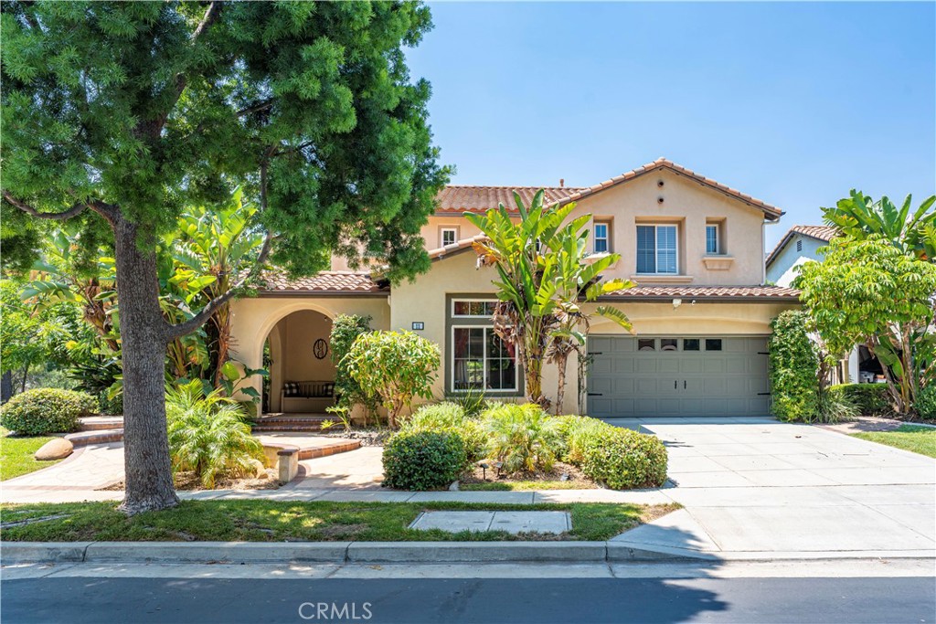 Tucked within a highly desirable gated community with 24/7 security, this beautifully maintained two-story home offers the perfect blend of comfort, space, and scenic beauty. Situated on a prime corner lot with breathtaking mountain views, this 4-bedroom, 3-bathroom home is thoughtfully designed for both everyday living and entertaining. Step through the spacious entry and into a bright and welcoming living room. Enter into a large kitchen featuring a center island, abundant cabinetry, and a dedicated dining area. Just off the kitchen, the cozy family room with its inviting fireplace offers a warm and relaxed atmosphere for gatherings. Ideal for multi-generational living or guests, the main floor includes a bedroom and full bathroom. Upstairs, the generous primary suite showcases stunning mountain views and a luxurious ensuite bathroom with dual sinks, a soaking tub, separate shower, and two separate closets. Two additional bedrooms share a full hall bathroom with dual sinks, and the upstairs laundry room complete with a sink adds convenience to your daily routine. Enjoy the outdoors in your private backyard, perfect for entertaining with a built-in BBQ and space to relax. Additional highlights include recessed lighting, dual-pane windows, commercial fire sprinkler system and a 3-car attached garage with direct access to the home. The community itself offers resort-style amenities including a sparkling pool, spa, playground, and clubhouse all within minutes of schools, parks, and shopping. Don’t miss your chance to own this exceptional home in one of Azusa’s most sought-after neighborhoods.