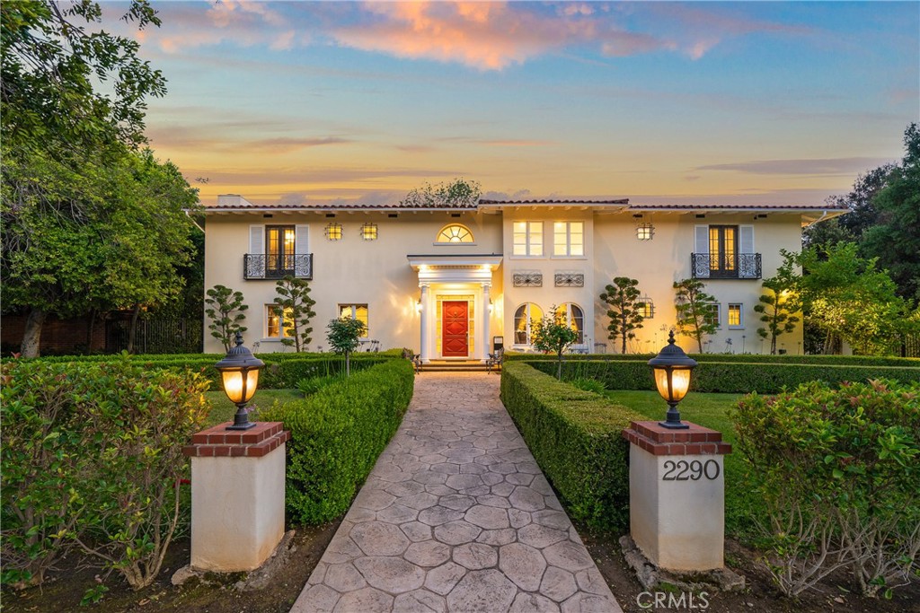 Situated in the esteemed neighborhood of San Marino, this Italian Renaissance masterpiece boasts proximity to iconic landmarks such as the Huntington Library, Art Museum and Botanic Gardens, Lacy Park, and the vibrant shops and restaurants of Lake Avenue. Originally built in 1927, rebuilt in 1998 and extensively remodeled in 2016, this estate combines timeless elegance with modern sophistication across resort-like grounds. Main house has 4 Beds / 5Bath: main floor has one bedroom suites, upper level has a master suites and two additional junior suites. Enter through a grand foyer showcasing soaring ceilings, leading you into an expansive living room bathed in natural light. A sophisticated office sits nearby, perfect for work or study, while the spacious family room provides an inviting space for gatherings and relaxation. At the heart of the home, the chef’s kitchen commands attention with premium appliances, custom cabinetry, and a generous marble island designed for both culinary preparation and casual dining. The main level offers a convenient one bedroom suite, thoughtfully positioned for privacy and comfort. Upstairs, the opulent master suite awaits, complete with a tranquil sitting area, a spa-inspired bathroom, and a walk-in closet. Two additional junior suites on this level provide flexible spaces that balance style and functionality. Beyond the main residence, a separate 444-square-foot pool house with bathroom—ideal for extended family, guests, or entertainment. There is another garage converted toy / game room. Every detail throughout has been curated to deliver exceptional living standards. Experience the best of luxurious California living, as this sophisticated sanctuary awaits its next discerning homeowner.