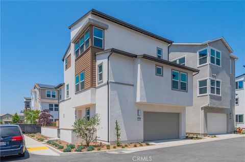 Photo of 446 Lobata, Irvine, CA 92618 (MLS # OC26101358)