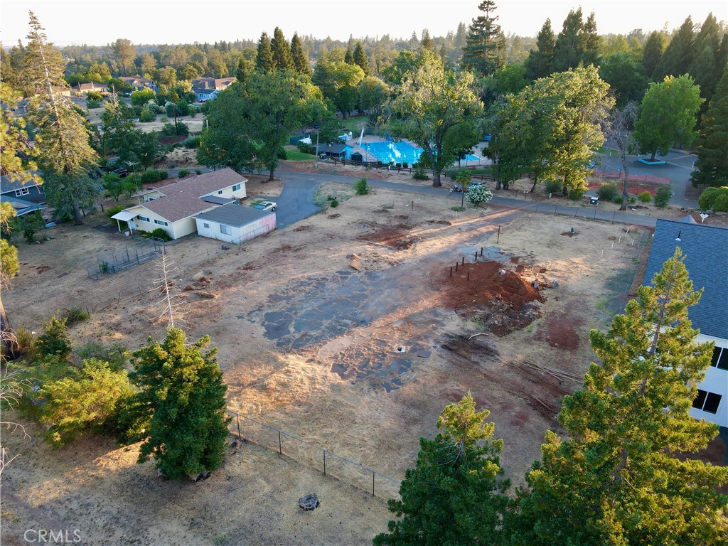 Beautiful lot in Paradise, zoned Multi-Family! Great location for in and out access out of Paradise. This lot previously had a duplex on it with a 1779 square ft footprint, and has also been cleared as well. Don't miss this great investment opportunity and to be apart of the rebuild process!